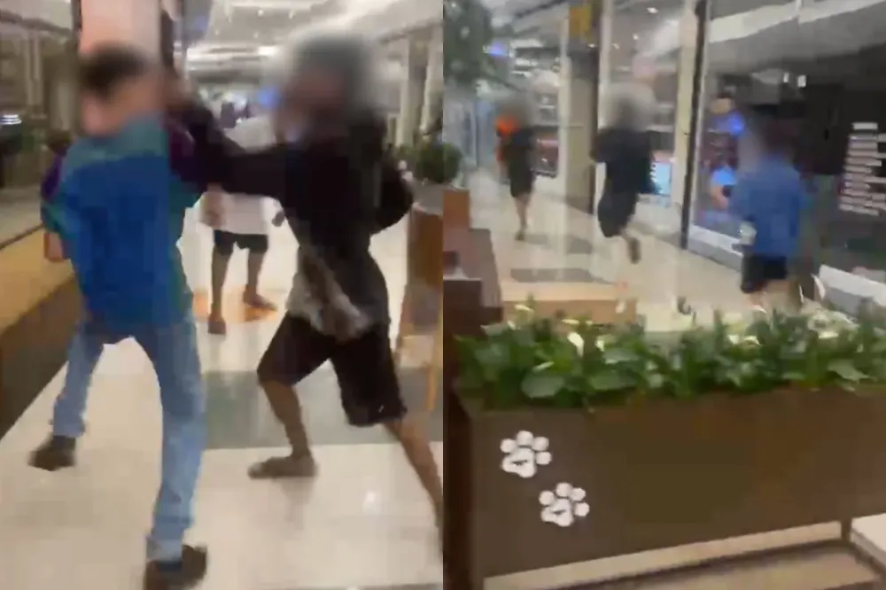 Vídeo mostra troca de agressões entre torcedores ligados às organizadas de Goiás e Vila Nova dentro do Passeio das Águas Shopping. (Imagem: Reprodução/Instagram/@trindadeuai.br)