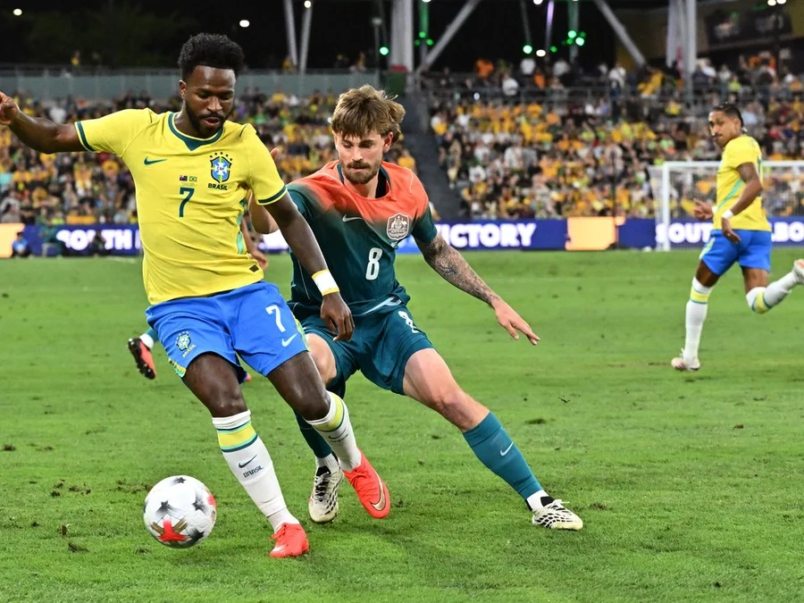 Brasil e Austrália empataram em 1 a 1 Foto : SAEED KHAN / AFP